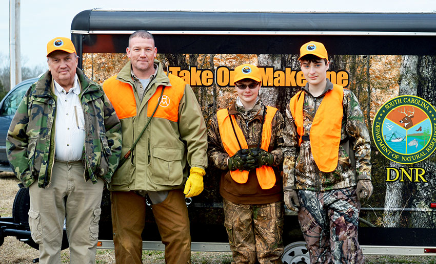 Left to right: Michael Fry, Jeff Fry, Colton Parks, and Kaleb Makin at a recent TOMO quail hunt at High Meadows Hunting Preserve.