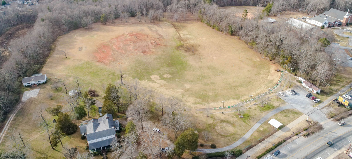 The sprawling grounds surrounding the Spring Park Inn, bottom left, will someday be transformed into a park and gathering place.