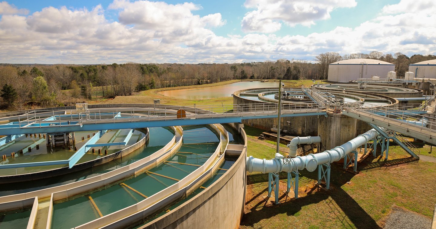 Water enters one of four large clarifiers to remove particles and organic matter